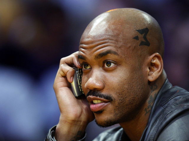 VIDEO: Stephon Marbury goes for ambitious block, gets crammed on by 'Chinese Shaq'