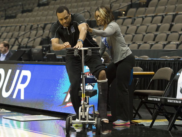 VIDEO: Injured Georgia State coach Ron Hunter arrives on a scooter