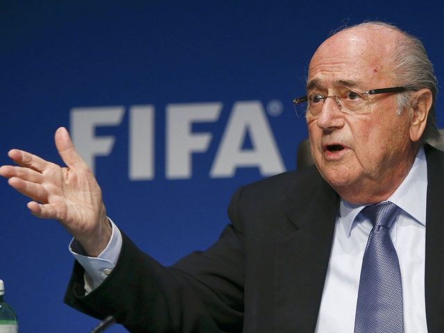 Report: Sepp Blatter may seek to remain as FIFA president despite resignation announcement