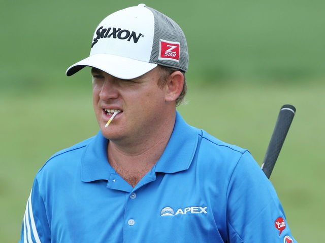 Holmes wins Houston Open in 3-man playoff