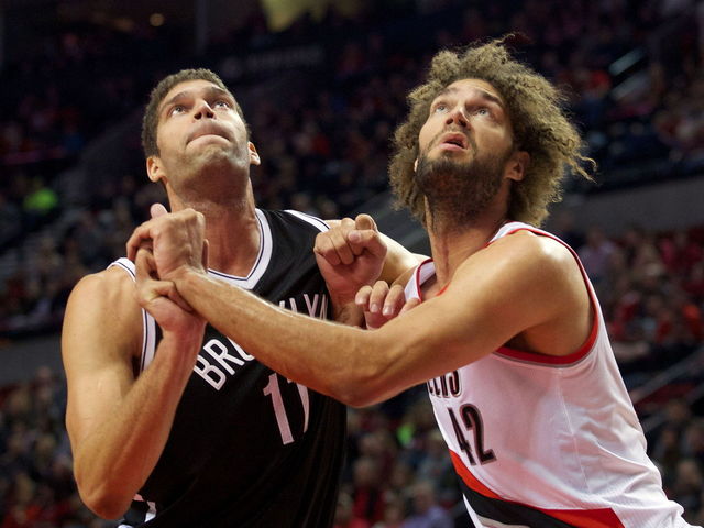 VIDEO: Twins Brook and Robin Lopez stage epic lightsaber battle