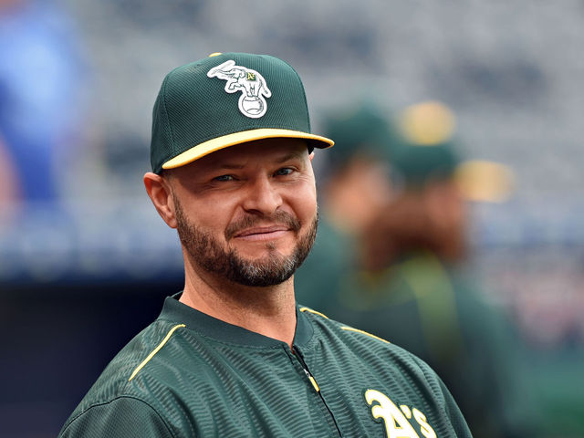Athletics release Cody Ross