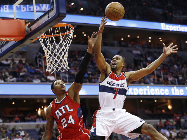 VIDEO: Sessions goes off top of the backboard for and-1