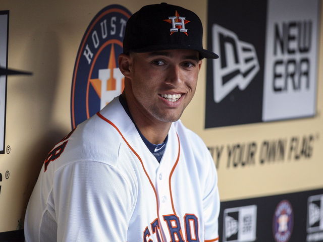 Astros' Springer evaluated for concussion after spectacular catch at the wall