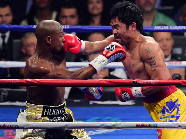Manny Pacquiao back in Philippines focusing on recovery, not Floyd Mayweather