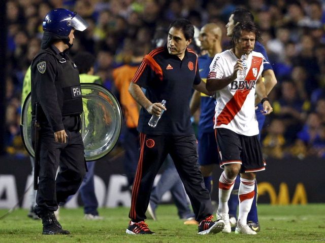 Apparent fan attack suspends Boca-River match: 'It's unbelievable what happened'