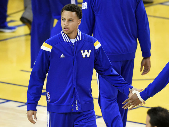 PHOTO: Steph Curry shows off his shoe game