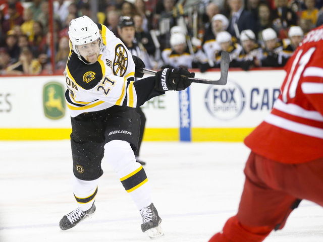 Bruins trade Hamilton to Flames for 15th overall pick, pair of 2nd-rounders