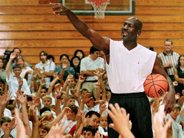 VIDEO: Jimmy Butler vs. Michael Jordan at summer camp shooting contest