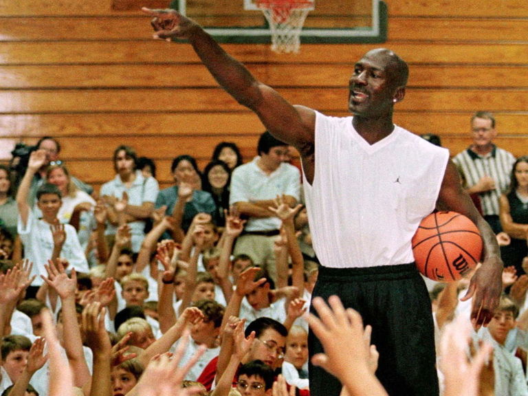 Origin sneakerhead VIDEO: Jimmy Butler vs. Michael Jordan at summer camp shooting contest