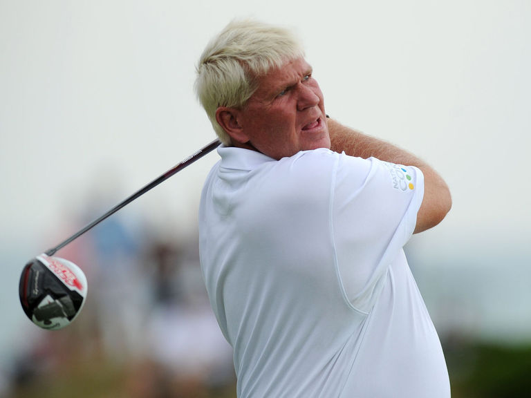 John Daly on the fairway in his blue, yellow, and white argyle