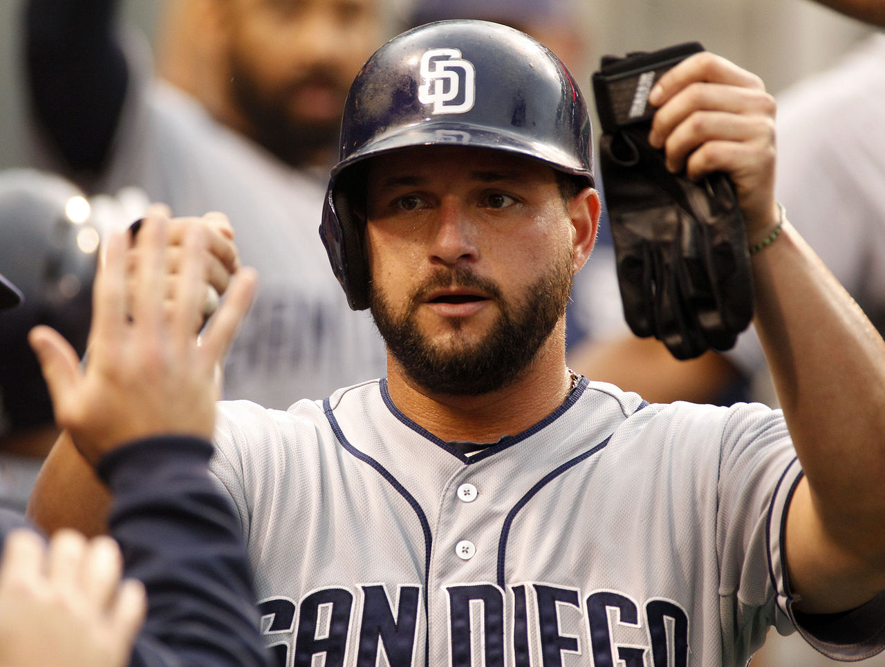 Alonso wears catcher's gear in the dugout 