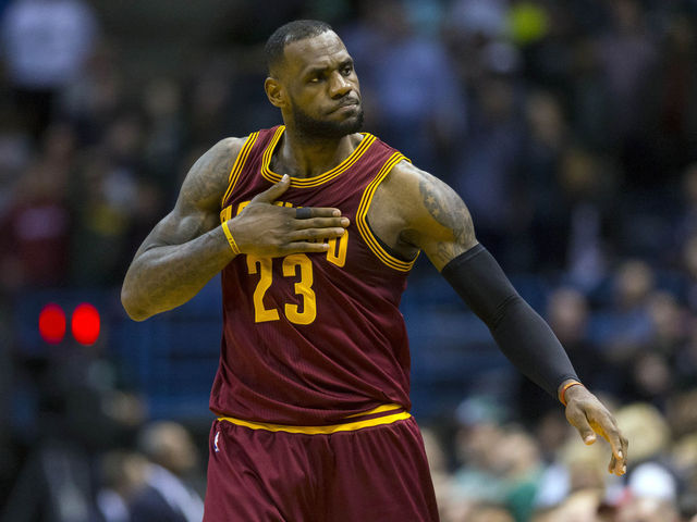 PHOTO: LeBron donates uniforms to Akron high school football team