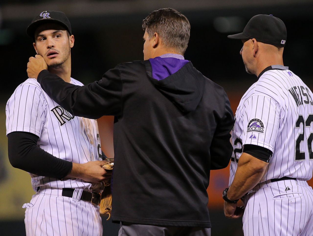 Rockies' Nolan Arenado, dealing with sore left shoulder, sits