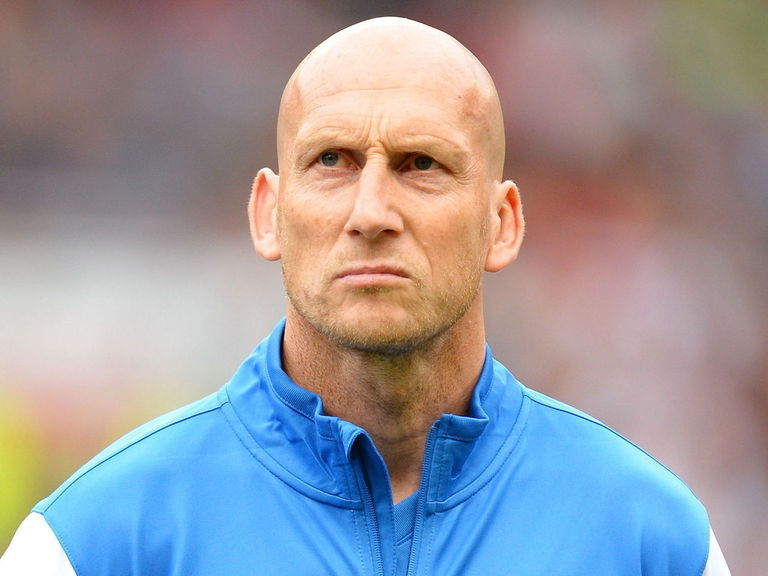 Ex-Manchester United defender Jaap Stam considers Premier League job ...