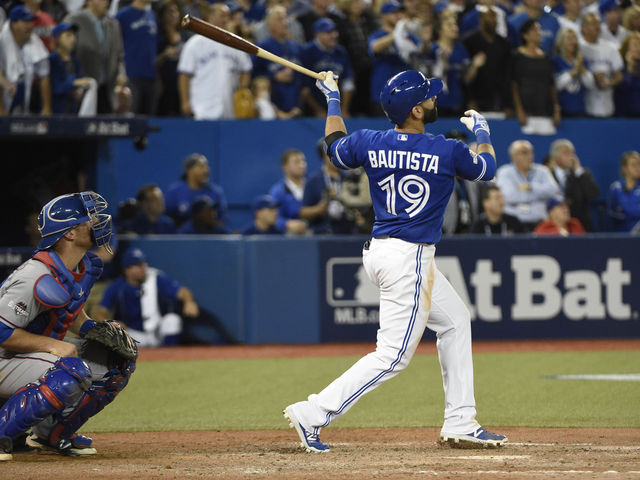 5 photos of Jose Bautista's epic bat flip