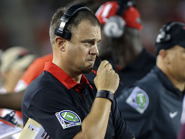 VIDEO: Paul Wall fits Houston coach Tom Herman with a grill