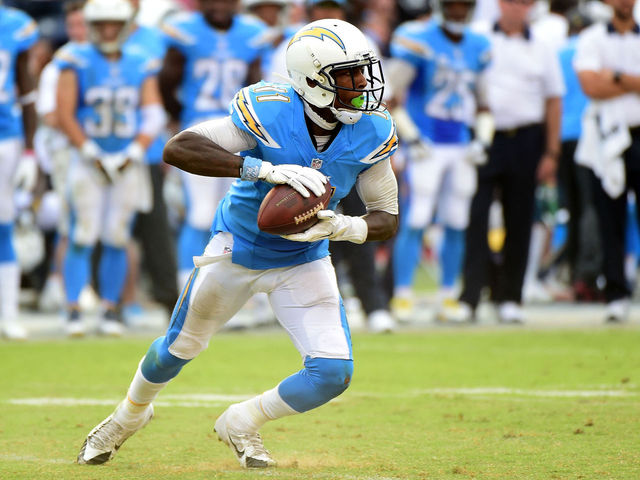 Chargers' Johnson undergoing evaluation on injured knee