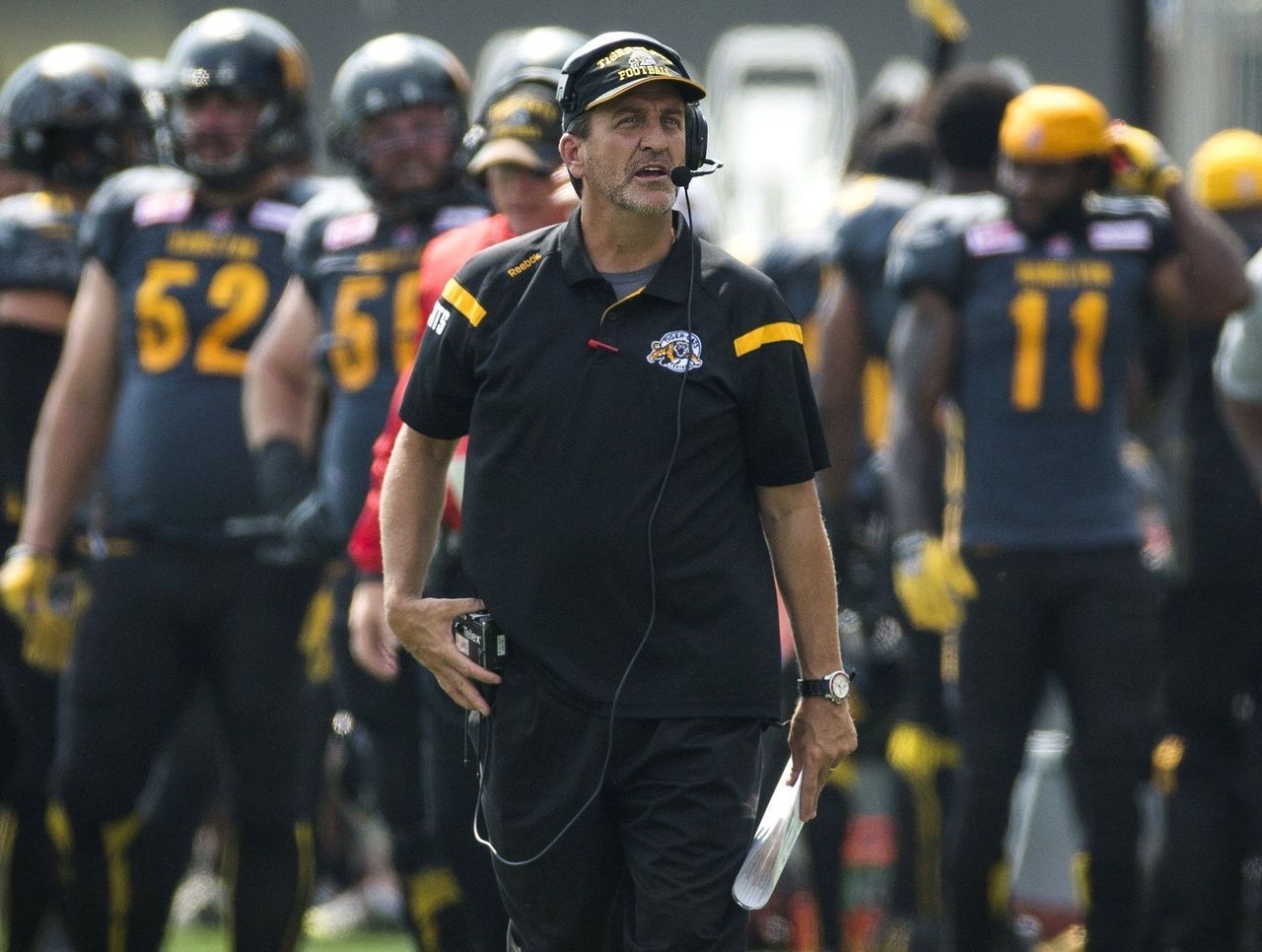 Tiger-Cats' Kent Austin barred from sideline for slapping official