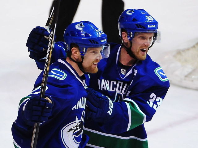 GM Jim Benning says Sedin twins will retire as Canucks