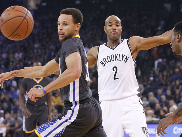Warriors hang on to preserve perfect record with gutsy win over Nets