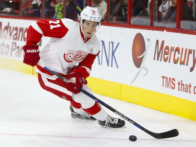 VIDEO: Dylan Larkin wheels through defense, sets up OT winner