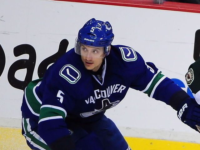 Canucks' Sbisa week to week with apparent arm injury