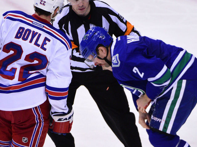 Canucks' Hamhuis suffers facial fracture, will undergo surgery