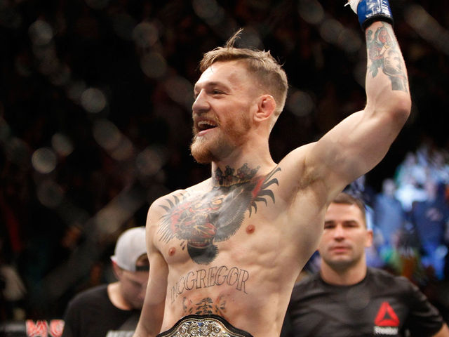 UFC 194: McGregor crushes Aldo in record time; Rockhold dominates Weidman