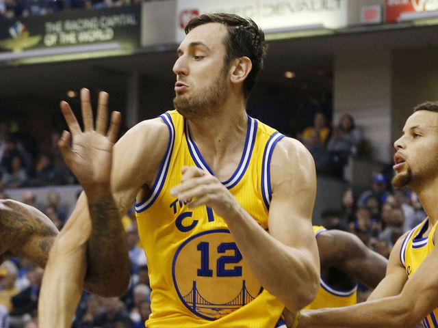 Warriors' Bogut suffers back sprain vs. Bucks