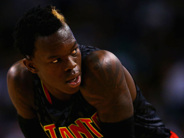 VIDEO: Hawks' Schroder loses tooth, places said tooth in sock