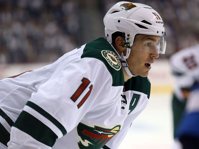 Parise returns as Wild face Flames