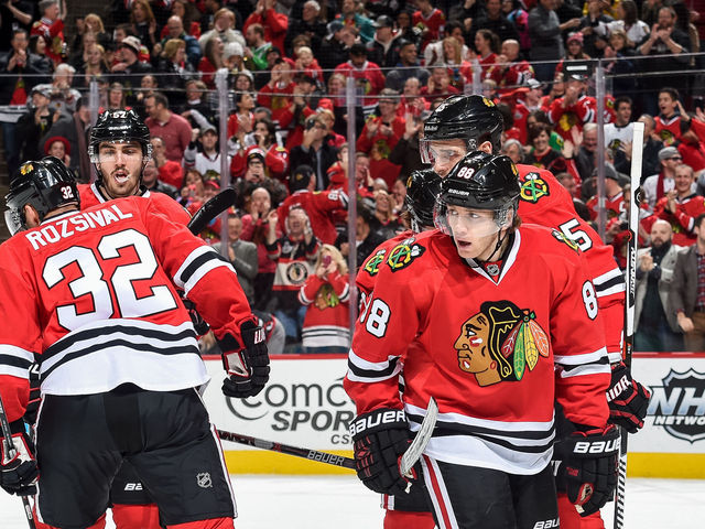 VIDEO: Patrick Kane plays keep-away, scores from long range