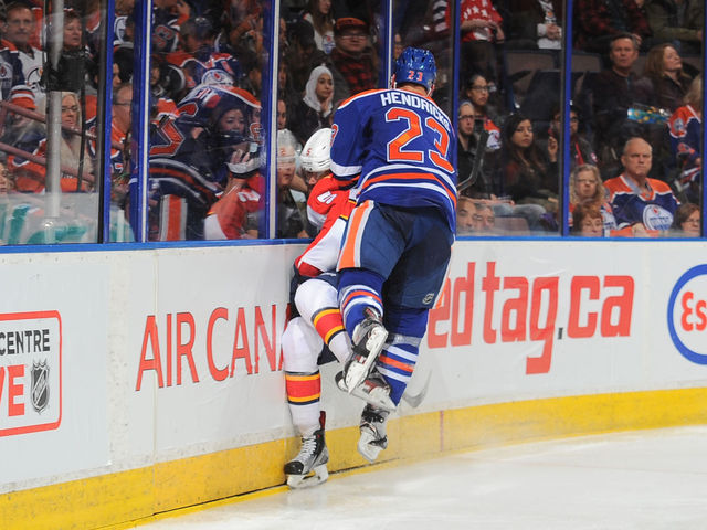Ekblad out vs. Canucks after being boarded by Oilers' Hendricks