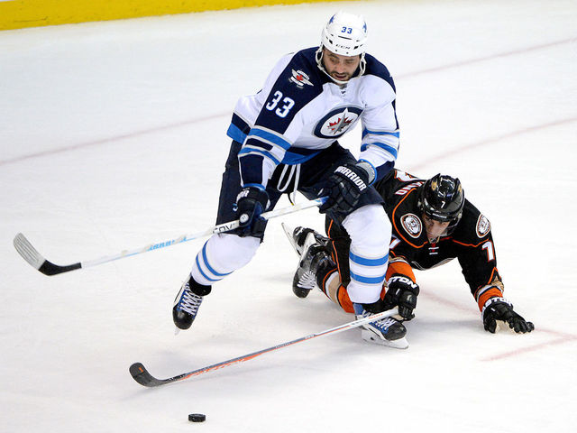 Jets' Byfuglien escapes significant injury, will be in lineup vs. Wild