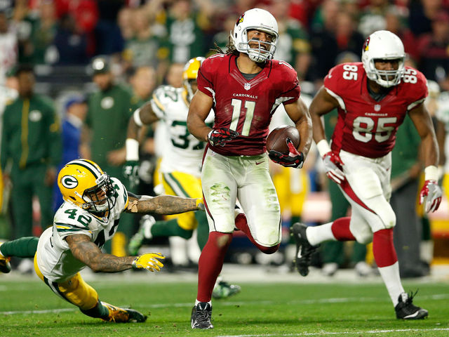 VIDEO: Fitzgerald weaves through defense to set up his game-winning TD