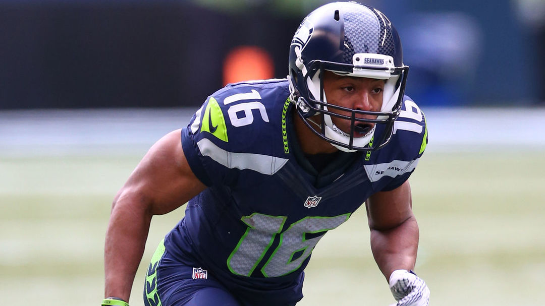 Seahawks' Lockett carted off with air cast on leg | theScore