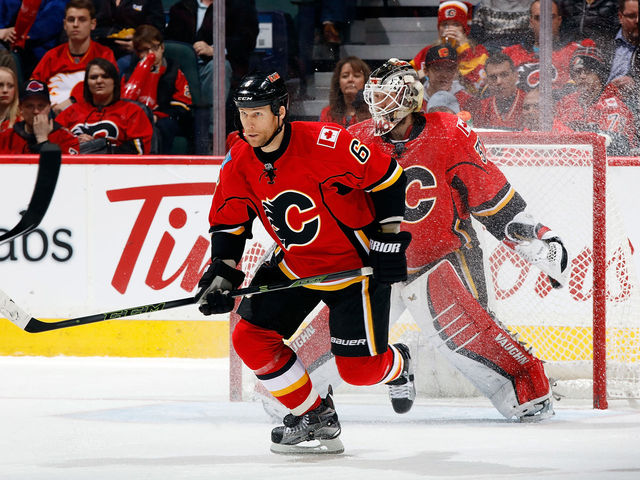 Flames' Wideman suspended indefinitely pending hearing for hitting linesman
