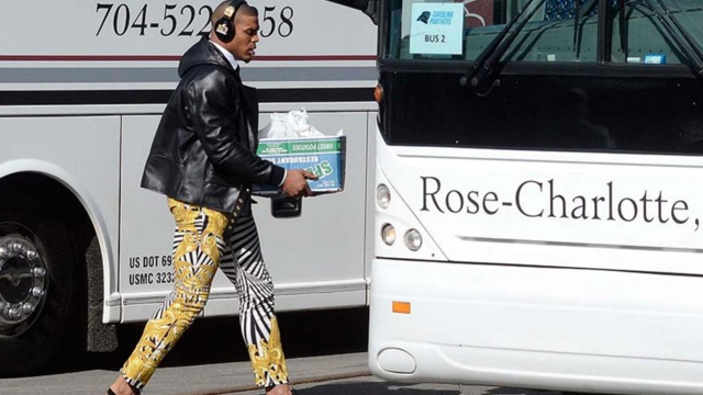 Cam Newton wears gold-accented zebra pants on trip to Super Bowl 50