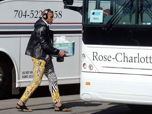 Cam Newton wears gold-accented zebra pants on trip to Super Bowl 50