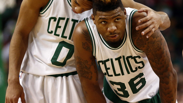VIDEO: Marcus Smart flops to distract Melo