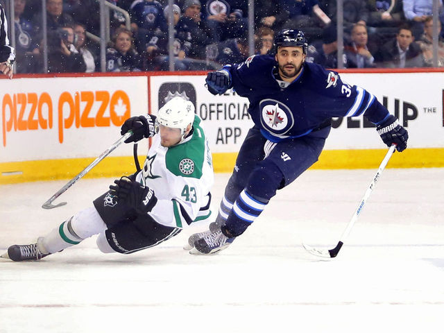 Byfuglien states desire to remain with Jets: 'You never want to leave home'