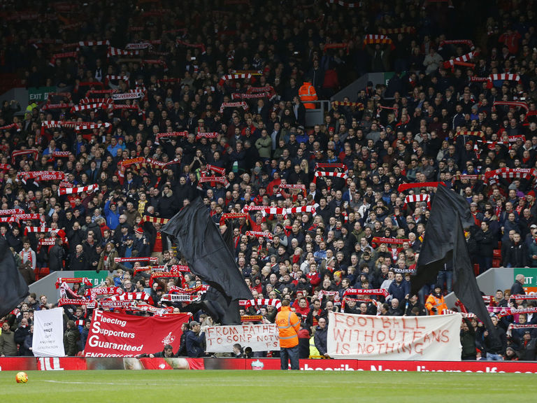 PHOTOS: Liverpool supporters walk out in 77th minute to protest ticket ...