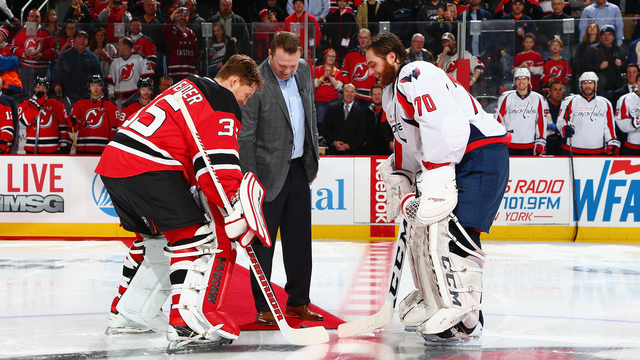 Goalies take ceremonial faceoff with Martin Brodeur