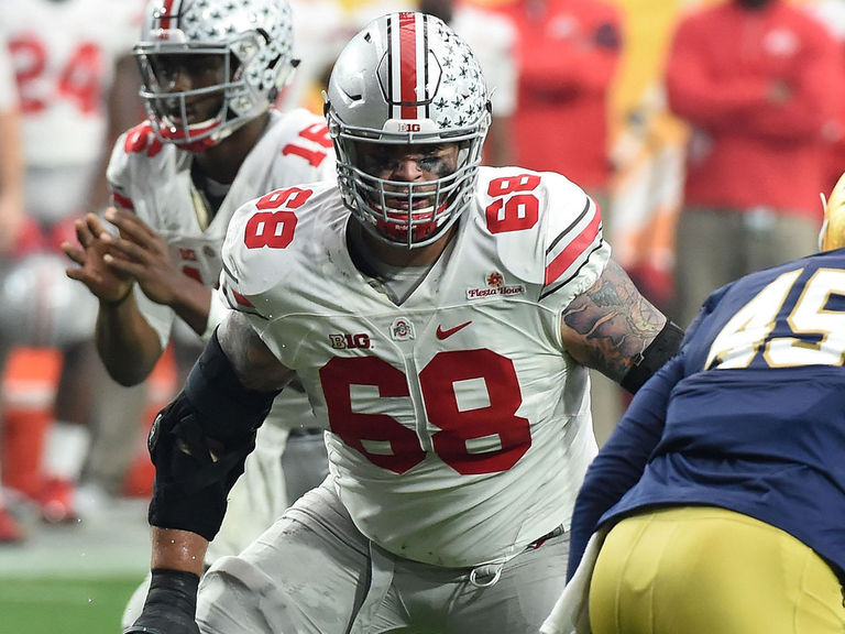 Lions add offensive anchor in Taylor Decker