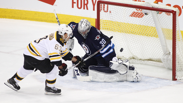 Marchand's 11th goal in 11 games leads Bruins over Jets