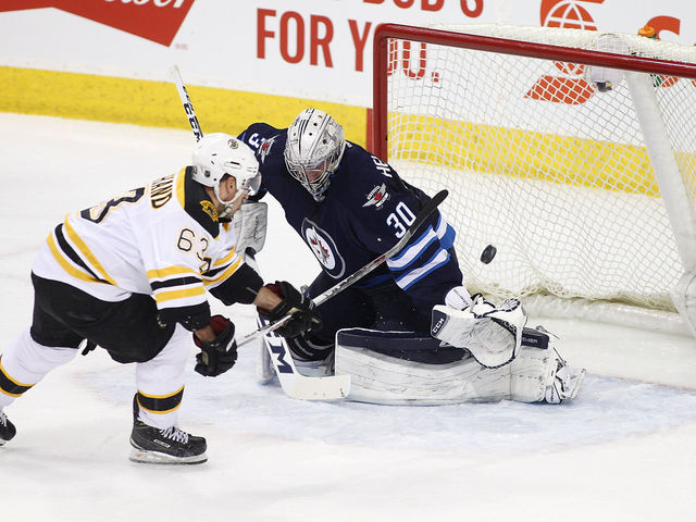 Marchand's 11th goal in 11 games leads Bruins over Jets