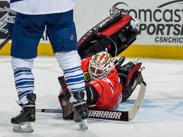 VIDEO: Blackhawks' Darling denies Spaling of 1st goal with desperation glove save