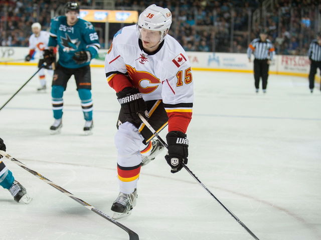 Flames' Smid won't play this season, not retiring yet