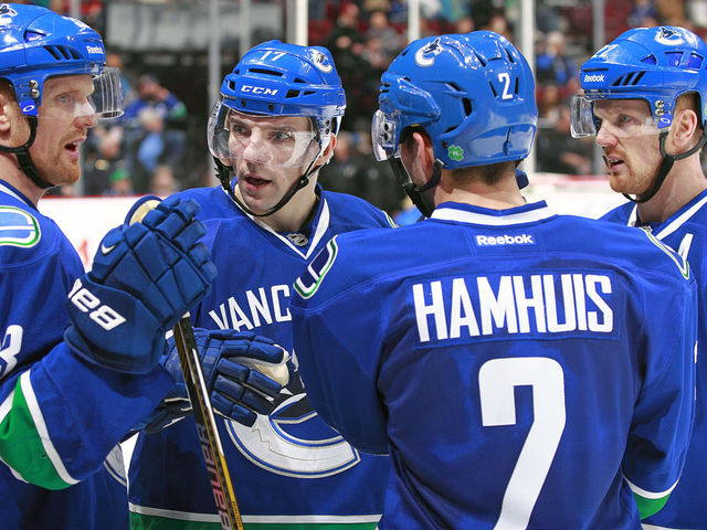 Report: Blackhawks have 'serious interest' in Canucks' Hamhuis, Vrbata
